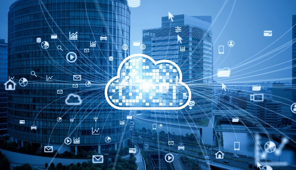 Cloud computing concept over cityscape architecture.