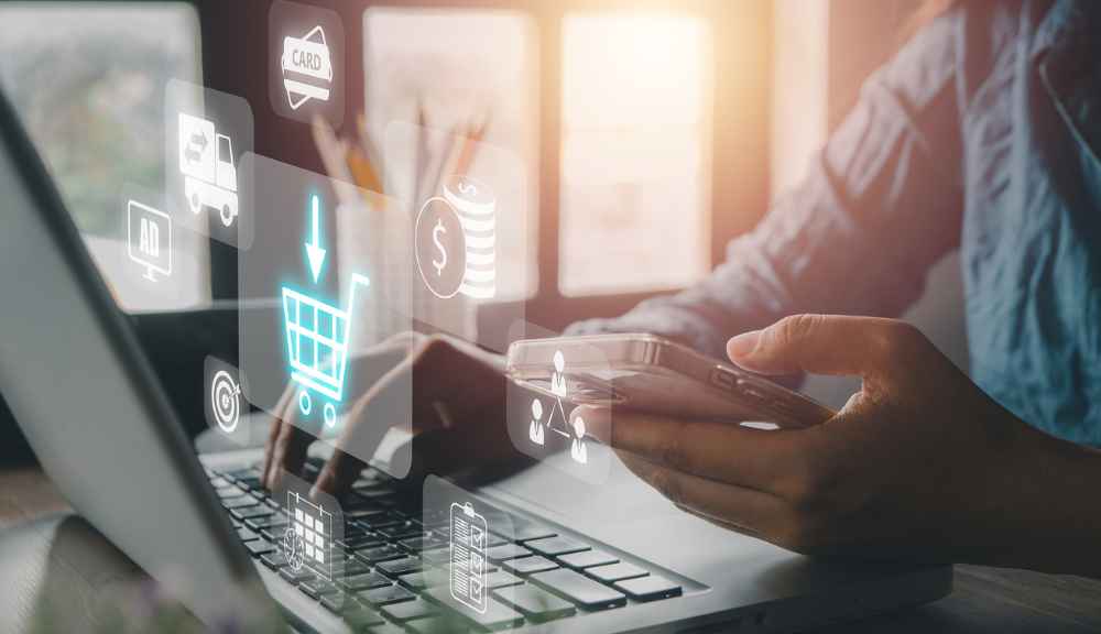 Online shopping on smartphone and laptop.