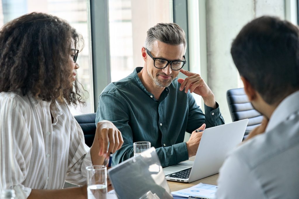 demand forecasting examples: diverse international executive business people working on proje